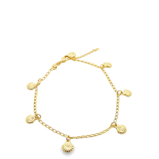 18K gold filled beach sea shells charm anklet by MIA Jewelry, featuring delicate shell charms on a gold chain.