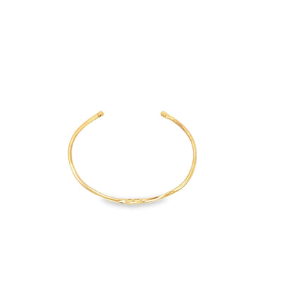 Minimalist evil eye open cuff bracelet bangle by MIA Jewelry, featuring a sleek design with an evil eye charm and open cuff style.