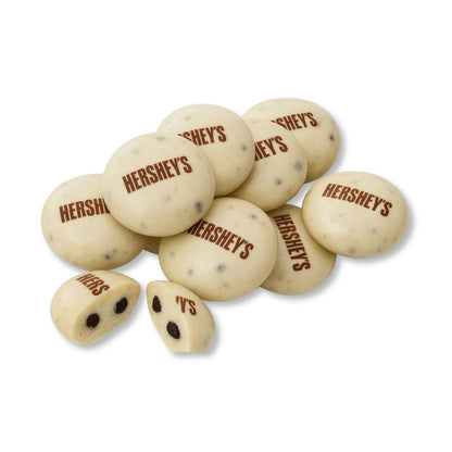 Hershey's Cookies 'N' Creme chocolate drops in a bulk value bag, showing white and cookie-filled candies.