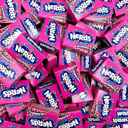 Assorted Nerds Strawberry candy in colorful mini boxes, featuring sweet and tangy crunchy candy from Candy In Bulk.