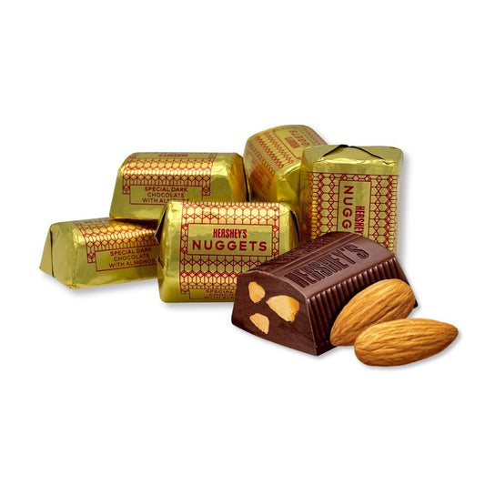 Hershey's Nuggets Special Dark chocolate with almonds in a bulk value bag, showing a close-up of the chocolate pieces with almonds inside