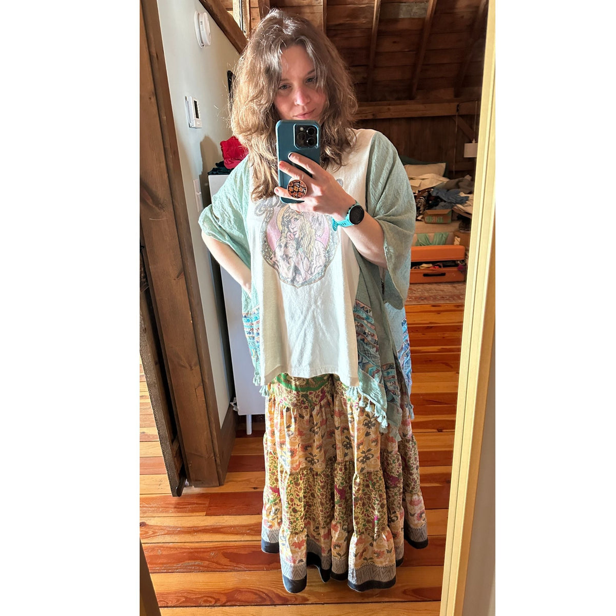 Limited edition Woodstock Dreams Fiesta Sunset skirt by Darn Good Yarn, featuring vibrant colors and flowing fabric.