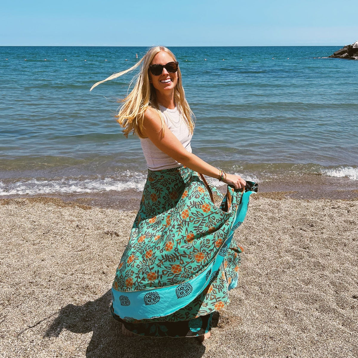 Darn Good Yarn Made With Love saree wrap skirt in colorful fabric, showcasing its vibrant, flowing design and traditional style.