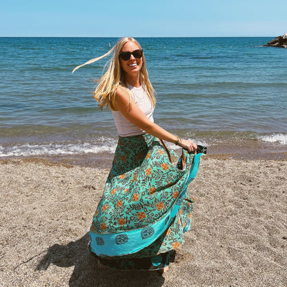 Darn Good Yarn Made With Love saree wrap skirt in colorful fabric, showcasing its vibrant, flowing design and traditional style.