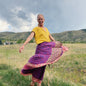 Colorful saree wrap skirt by Darn Good Yarn, showcasing vibrant fabric with intricate patterns and a flowing, versatile design.