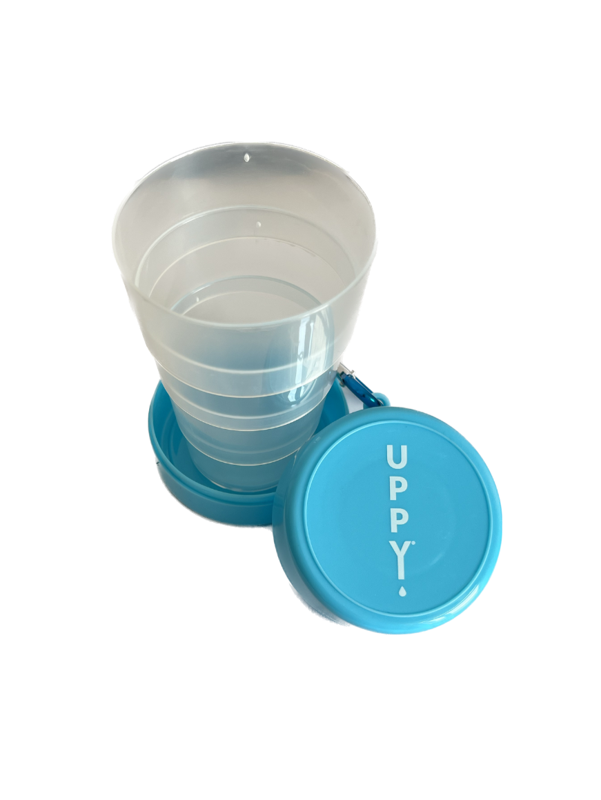 Uppy! On-The-Go Cup with electrolyte tablet holder for hydration, featuring a sleek design and convenient portable use.