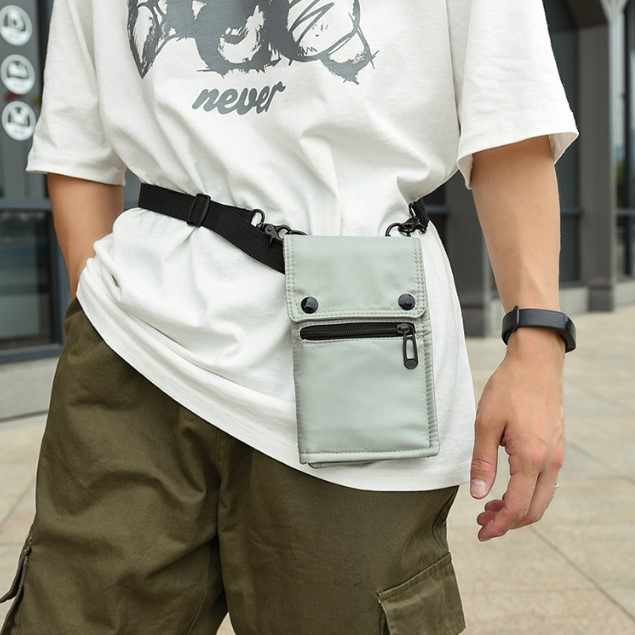 Grey NNEDSZ water-resistant nylon crossbody bag with wallet and card holder for women, compact travel accessory for phones and essentials.