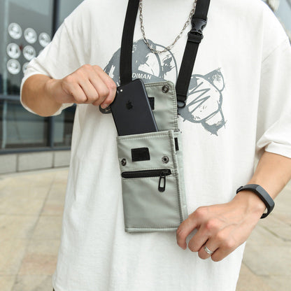 Grey NNEDSZ water-resistant nylon crossbody phone bag with compact design, ideal for travel, holding mobile phones and cards.