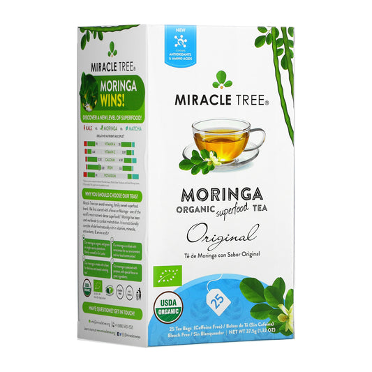 Organic Miracle Tree Moringa herbal tea in a cup, showcasing fresh moringa leaves and tea bag for caffeine-free herbal tea.