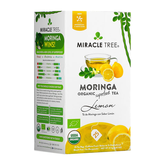 Organic Moringa Tea with lemon by Miracle Tree, caffeine-free herbal tea in a clear cup showing tea leaves and lemon slices.