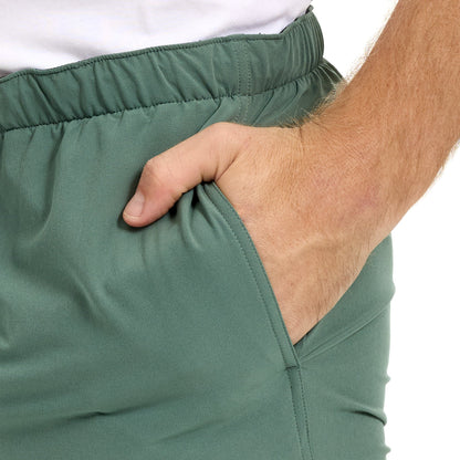 GameGuard Ironwood SeaDrift Pant, lightweight fishing pants with adjustable waist and multiple pockets, designed for outdoor comfort.