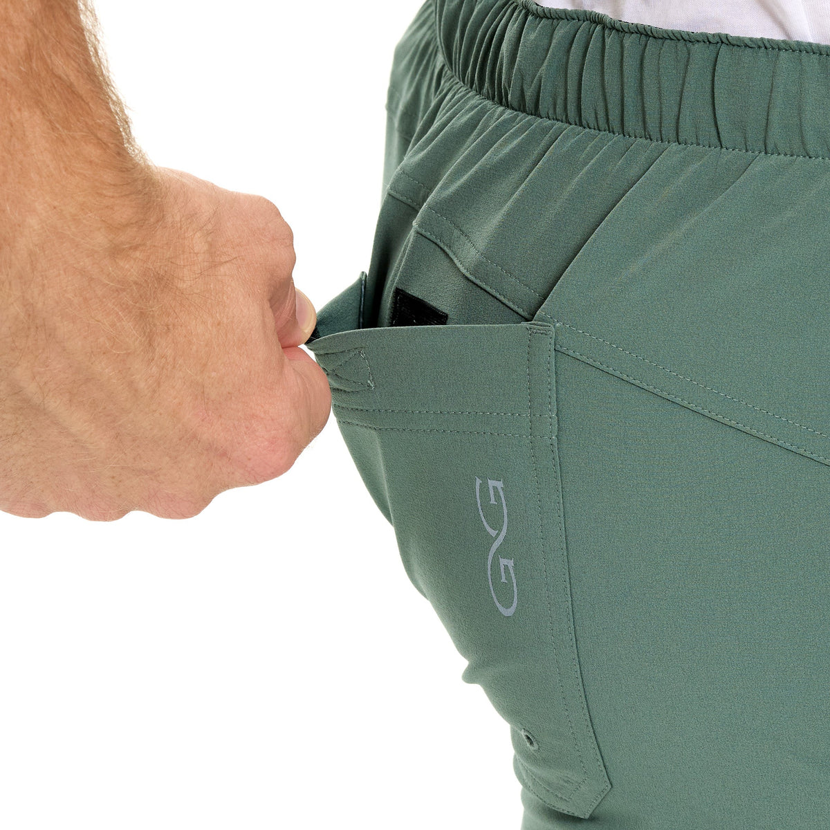 GameGuard Ironwood SeaDrift Pant, lightweight fishing pants with adjustable waistband and multiple pockets for outdoor activities.