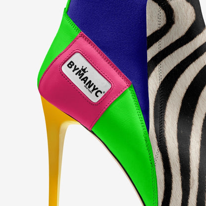 Women's vegan heeled Chelsea shoe by BYMANYC New York in black, stylish pointed toe design with a sleek edge.