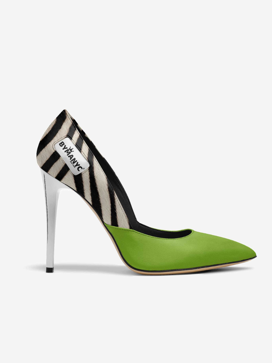 Vegan women's stiletto shoe by BYMANYC New York in green, featuring a sleek design and luxe style, displayed on a boutique inventory background.