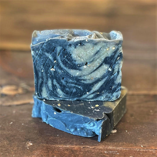 Voodoo Shaving Soap by Soaplicity in a lathered shaving soap container, showcasing its rich, creamy texture for a smooth shave.