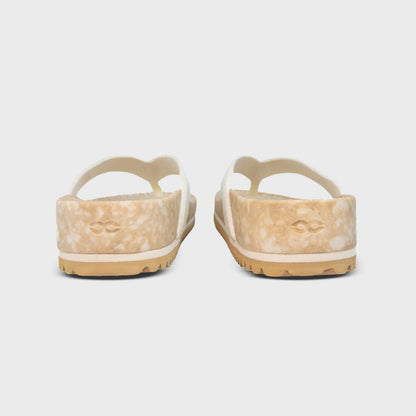 Pair of Fleks West Beach Flip Flops in oatmeal color, showing the rear view of the casual slip-on sandals.