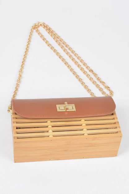 Women's Madison Avenue handbag by BYMANYC New York, stylish black bag with leather accents and gold hardware.