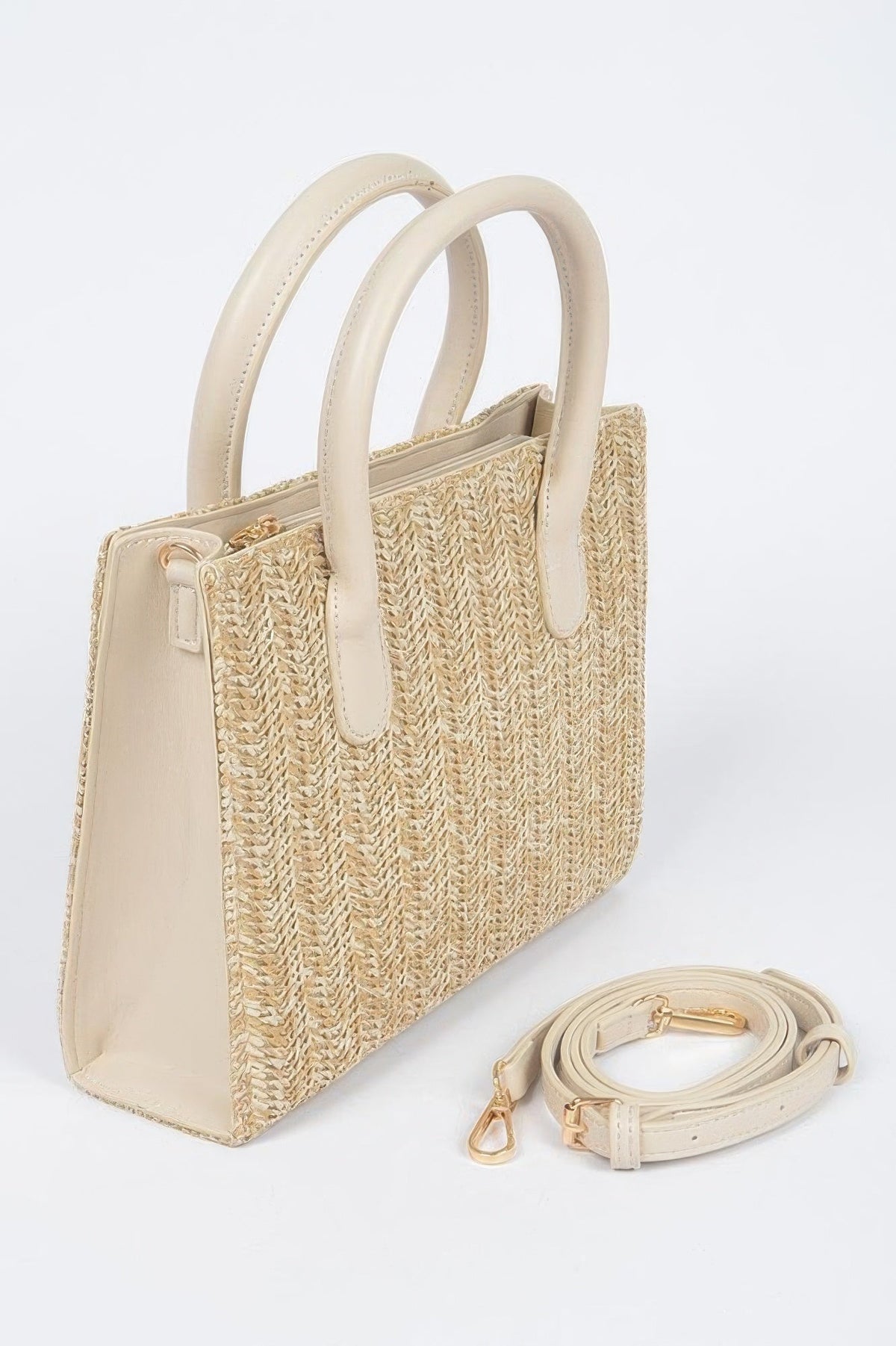 Women's handbag from BYMANYC New York's Meatpacking Studio collection, stylish black leather bag with gold accents.