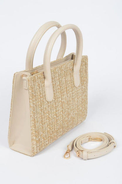 Women's handbag from BYMANYC New York's Meatpacking Studio collection, stylish black leather bag with gold accents.