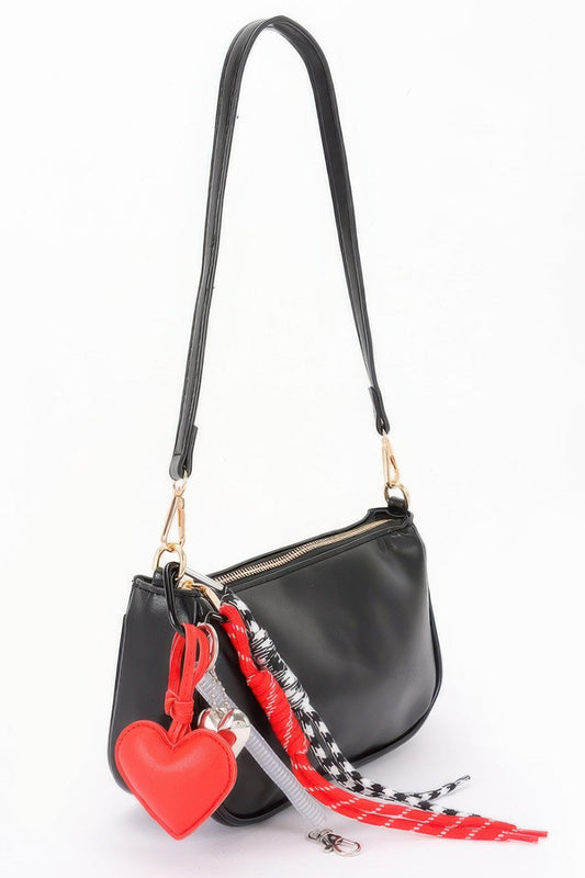 Women's Tribeca handbag by BYMANYC New York, stylish bag with sleek design, featuring leather texture and modern details.