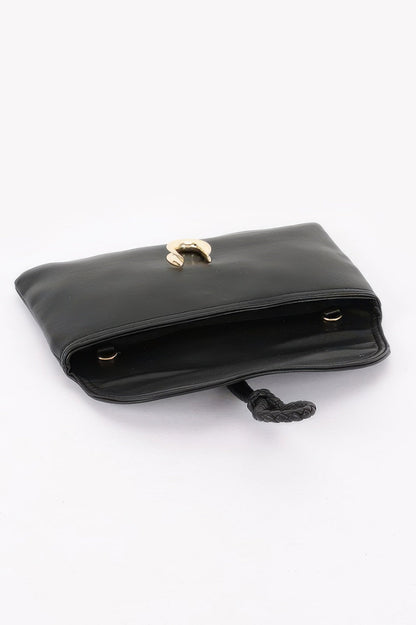 Women's Soho handbag from Ibiza by Manyc New York, stylish leather bag with gold accents and adjustable strap.