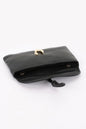 Women's Soho handbag from Ibiza by Manyc New York, stylish leather bag with gold accents and adjustable strap.
