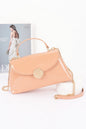 Women's Chelsea handbag from Ibiza by Manyc New York, stylish leather bag with gold hardware and spacious interior.