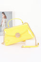 Women's Chelsea handbag from Ibiza by Manyc, stylish black bag with gold accents, made by BYMANYC New York.