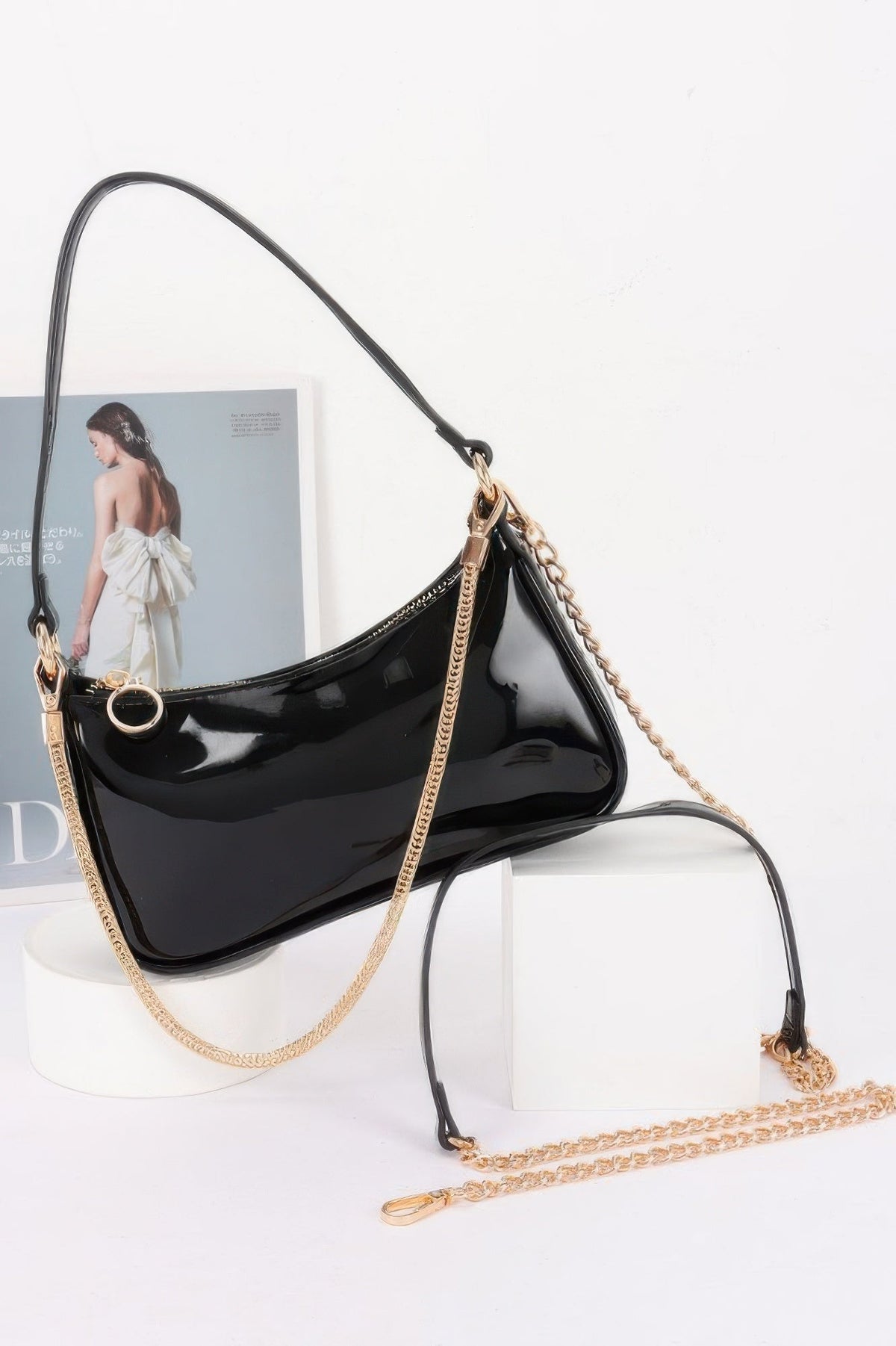 Women's beige Ibiza by Manyc NY handbag from the No Li Ta collection, stylish bag with gold hardware and adjustable strap.