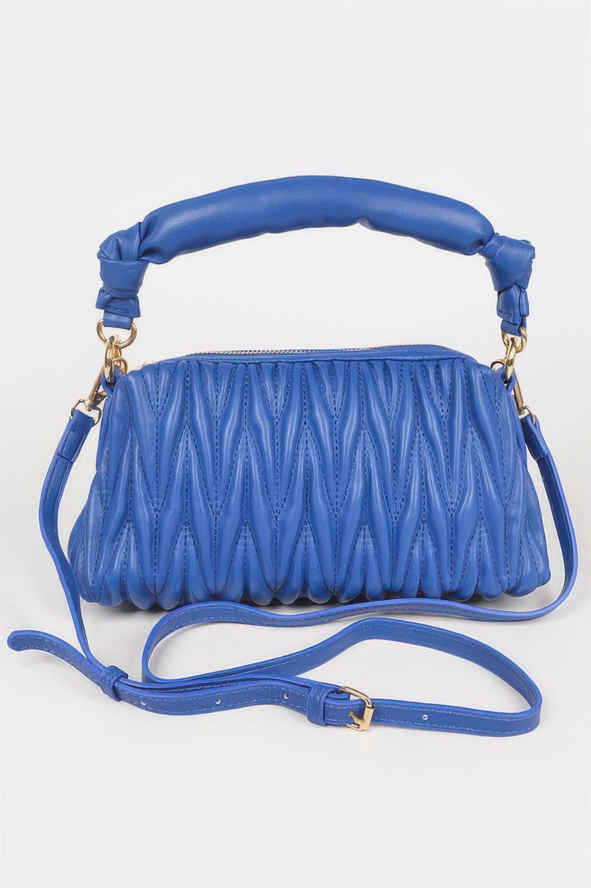 Women’s Cala Blanca Ibiza by Manyc NY handbag in natural leather with gold accents and adjustable shoulder strap.