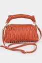 Women's Cala Blanca handbag from the Ibiza collection by BYMANYC New York, stylish bag with elegant design and multiple compartments.