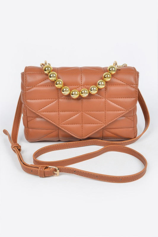 Women's Cala Comte handbag from Ibiza by Manyc New York, stylish bag with leather details and elegant design.