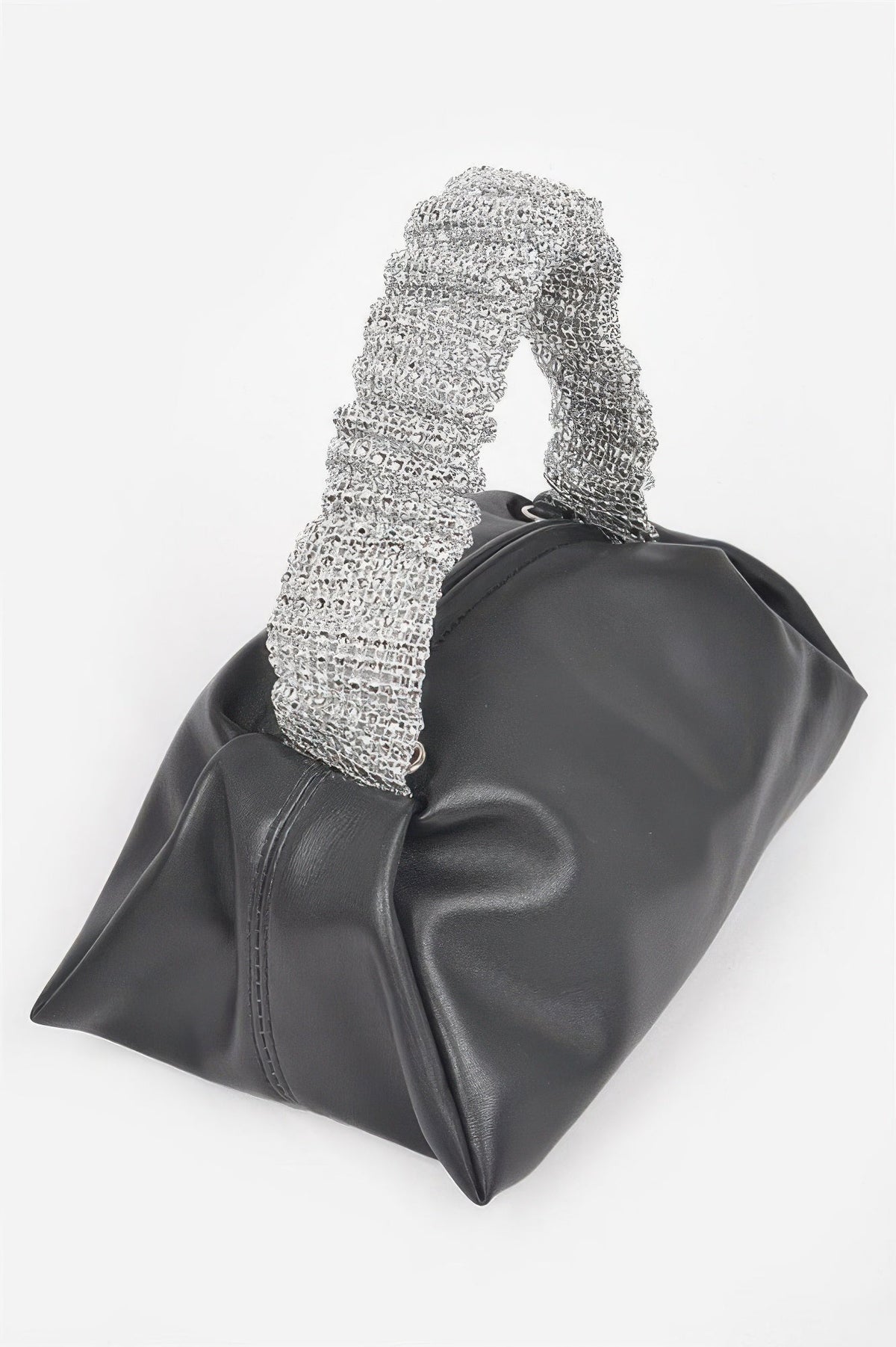 Women’s handbag Cala d’en Serra by BYMANYC New York, stylish clutch with leather strap and elegant design.