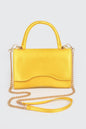 Women's black leather handbag by BYMANYC New York from the Cala Llenya collection, featuring elegant design and gold accents.