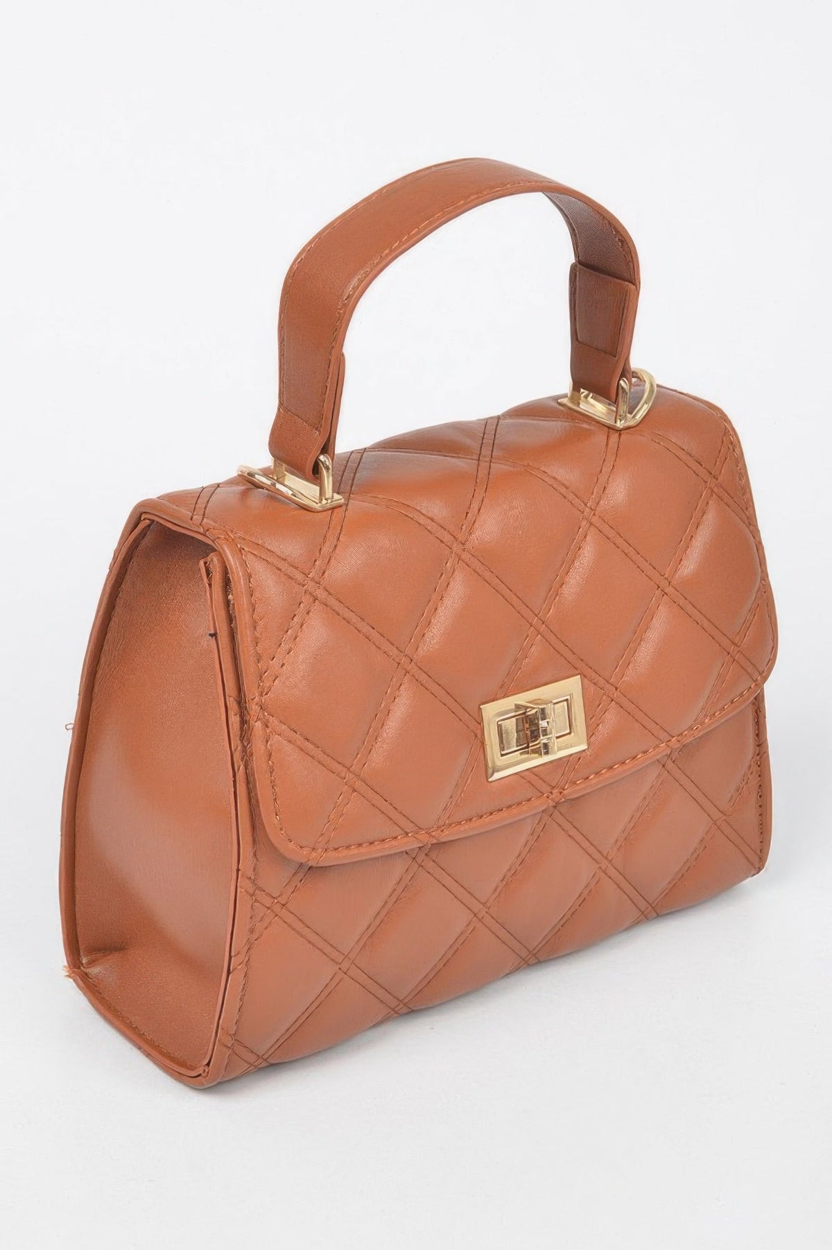 Women's Cala Bassa handbag by BYMANYC New York featuring a stylish design with leather straps and gold accents.