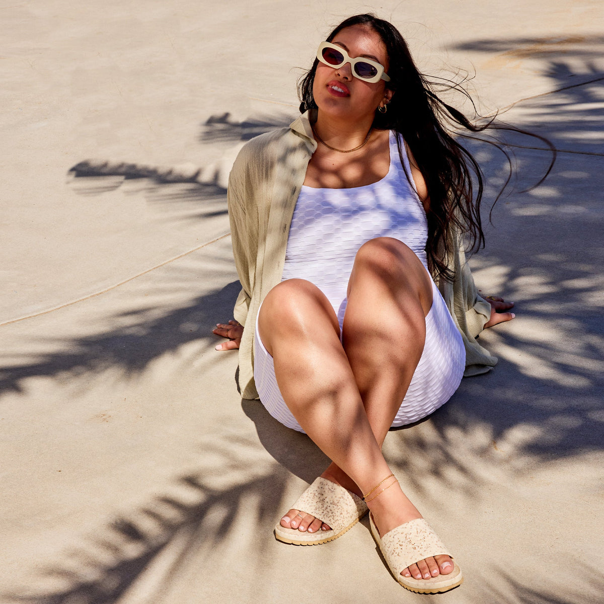 White East Beach Slide by Fleks featuring a comfortable slip-on design and casual style, perfect for beachwear.