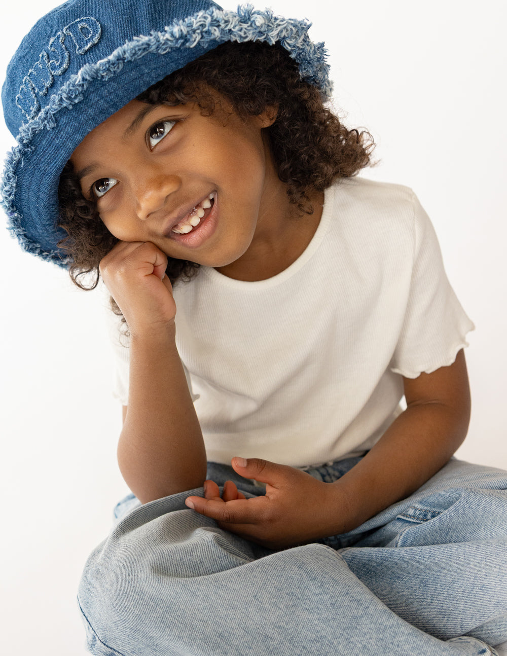 Kids denim bucket hat with WWJD embroidery by Elevated Faith, featuring a casual, stylish design for children.