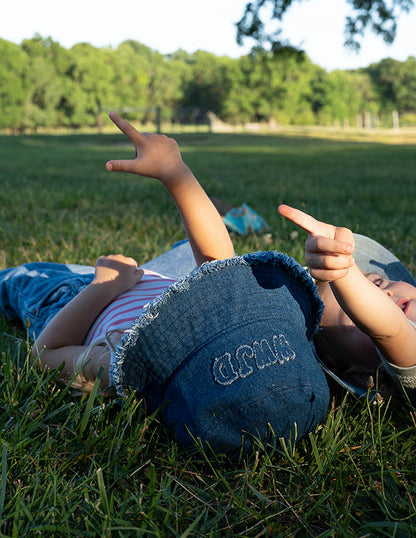 Kids denim bucket hat with WWJD design by Elevated Faith, featuring a wide brim and casual style for children.