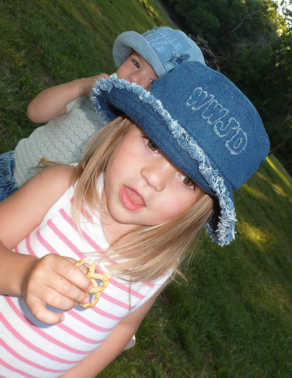 Kids denim bucket hat with WWJD design by Elevated Faith, perfect for children’s casual and outdoor wear.