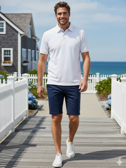 White Water Life Coastline Polo shirt in white, featuring a classic polo collar and short sleeves, laid flat on a neutral background.