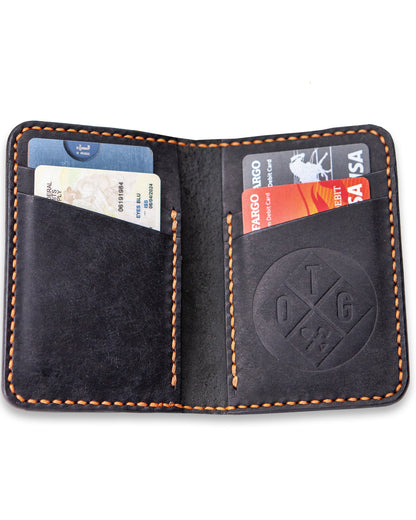 Off The Grid Surplus Borderland Leather Bifold Wallet showing brown leather exterior with card slots and a secure fold-over design.