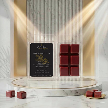SAHC Home Fragrances Midnight Gin wax melts in a clear container, showcasing deep purple and blue wax with elegant branding.