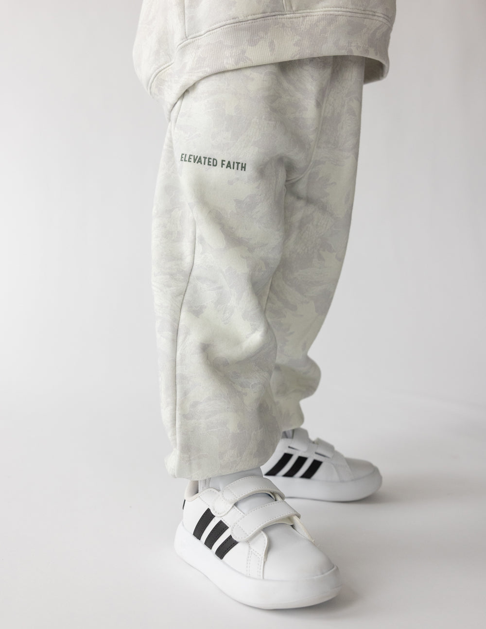 Kids camo sweatpant by Elevated Faith featuring "What a Friend in Jesus" print, casual and comfortable for children.
