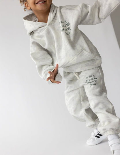 Camo kids sweatpants from Elevated Faith with "What a Friend in Jesus" print, soft fabric, comfortable fit for children.