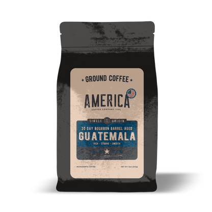 Ground Guatemala coffee from America Supply Company LLC aged in whiskey barrels, highlighting rich aroma and single origin flavor.