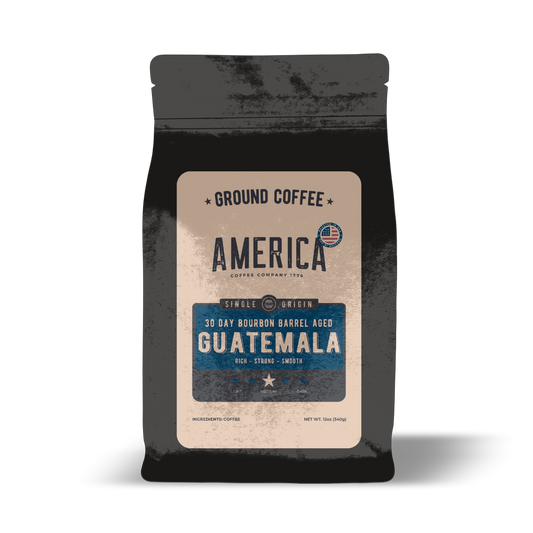 Ground Guatemala coffee from America Supply Company LLC aged in whiskey barrels, highlighting rich aroma and single origin flavor.