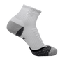 White iReliev AMP ankle compression sock showing snug fit and elastic material for support and improved circulation.
