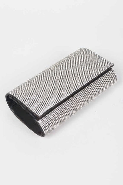 Women's rhinestone clutch handbag from THE VILLAGE by BYMANYC New York, featuring sparkling embellishments and a sleek design.