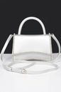 Women's top handle flap handbag by BYMANYC New York featuring a stylish design and elegant leather material.