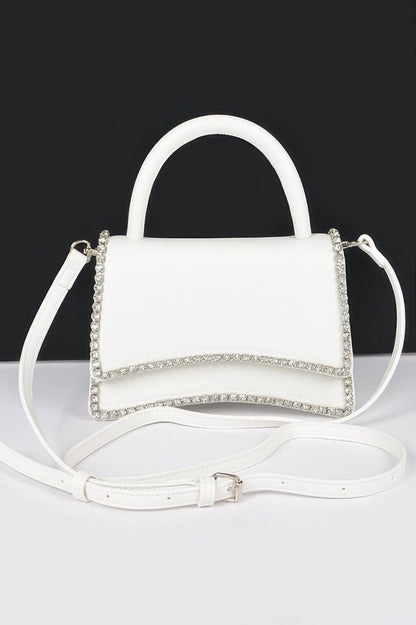 Women's UPPER WEST top handle flap handbag by BYMANYC New York, stylish leather bag with a sleek top handle and flap closure.